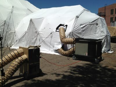 equipment with tent in field