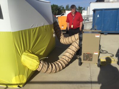 equipment with tent in field