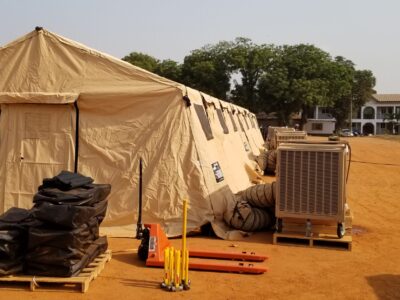 equipment with tent in field