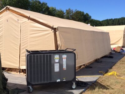 equipment with tent in field