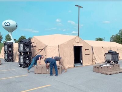 equipment with tent in field