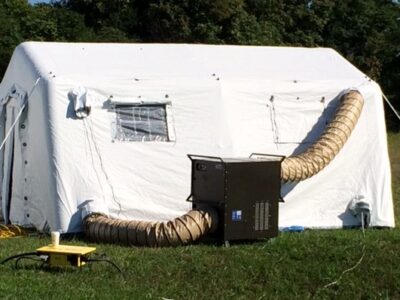 equipment with tent in field