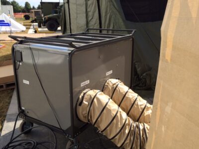 equipment with tent in field