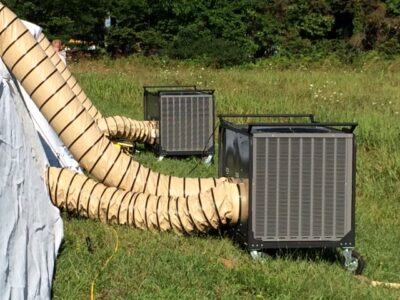 equipment with tent in field