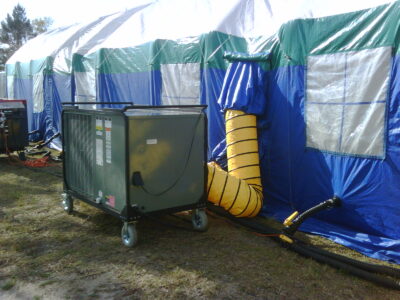 equipment with tent in field