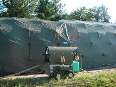 equipment with tent in field