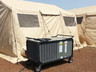 equipment with tent in field