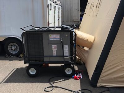 equipment with tent in field