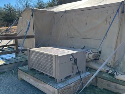 equipment with tent in field