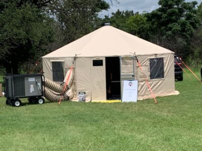 equipment with tent in field