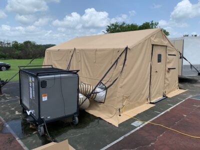 equipment with tent in field