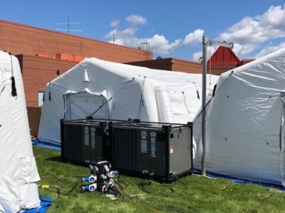 equipment with tent in field