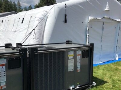 equipment with tent in field