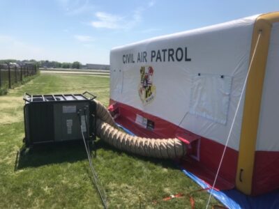 equipment with tent in field