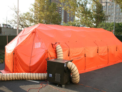 equipment with tent in field