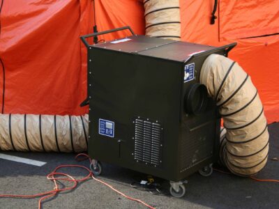 equipment with tent in field